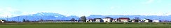 Alps view from Po Valley with the fields (Mantua, Italy)